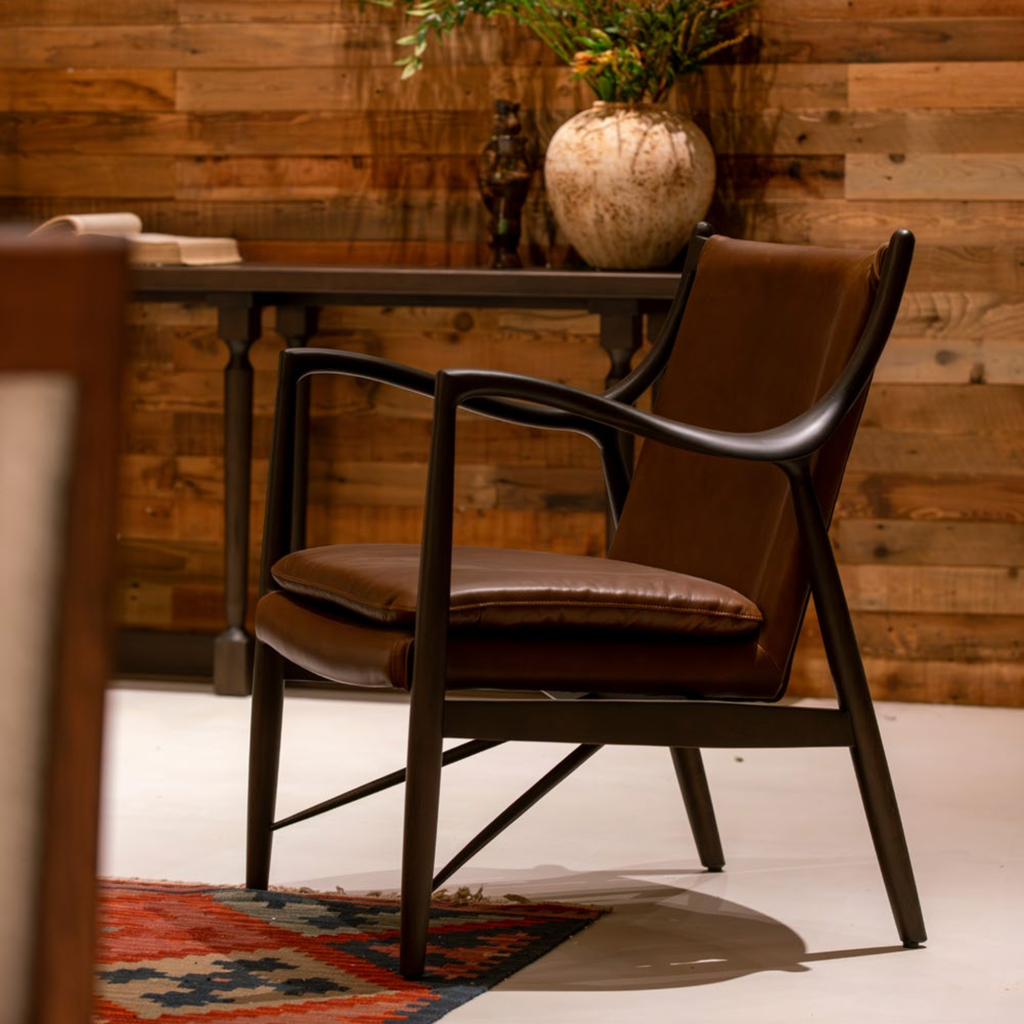 KBH Saddle Hide Chair in a grounded dark palette