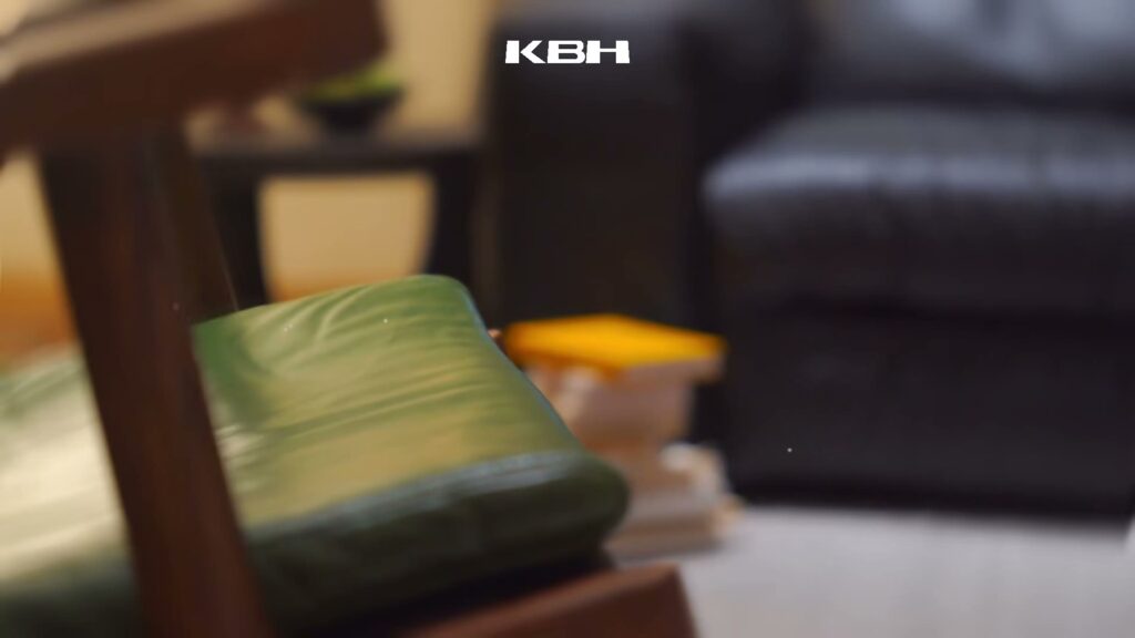 Still from the KBH film: The vintage green leather chair that sets the mood