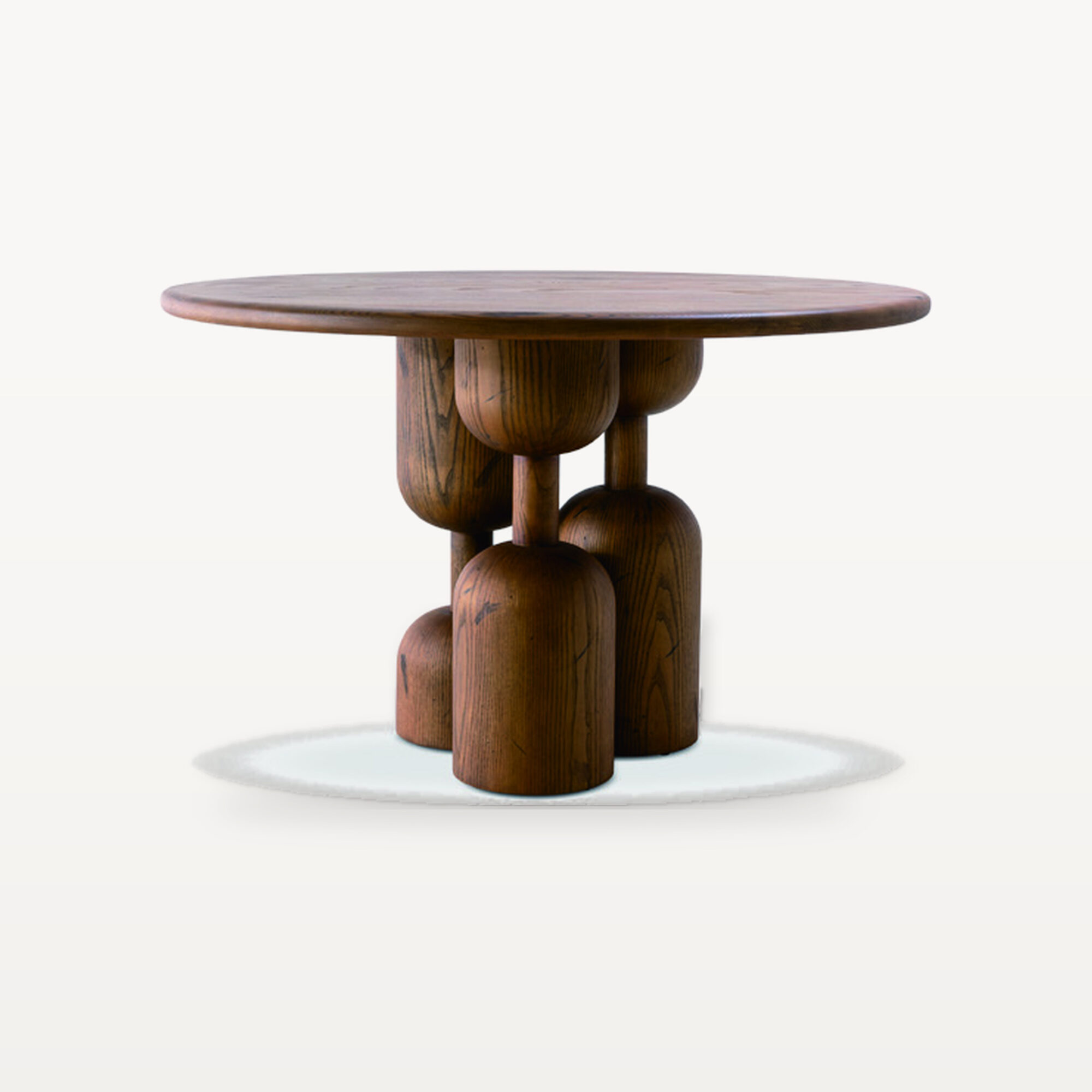 Warm Gathering scene by KBH with the Hourglass Round Table, photographed in a dining room
